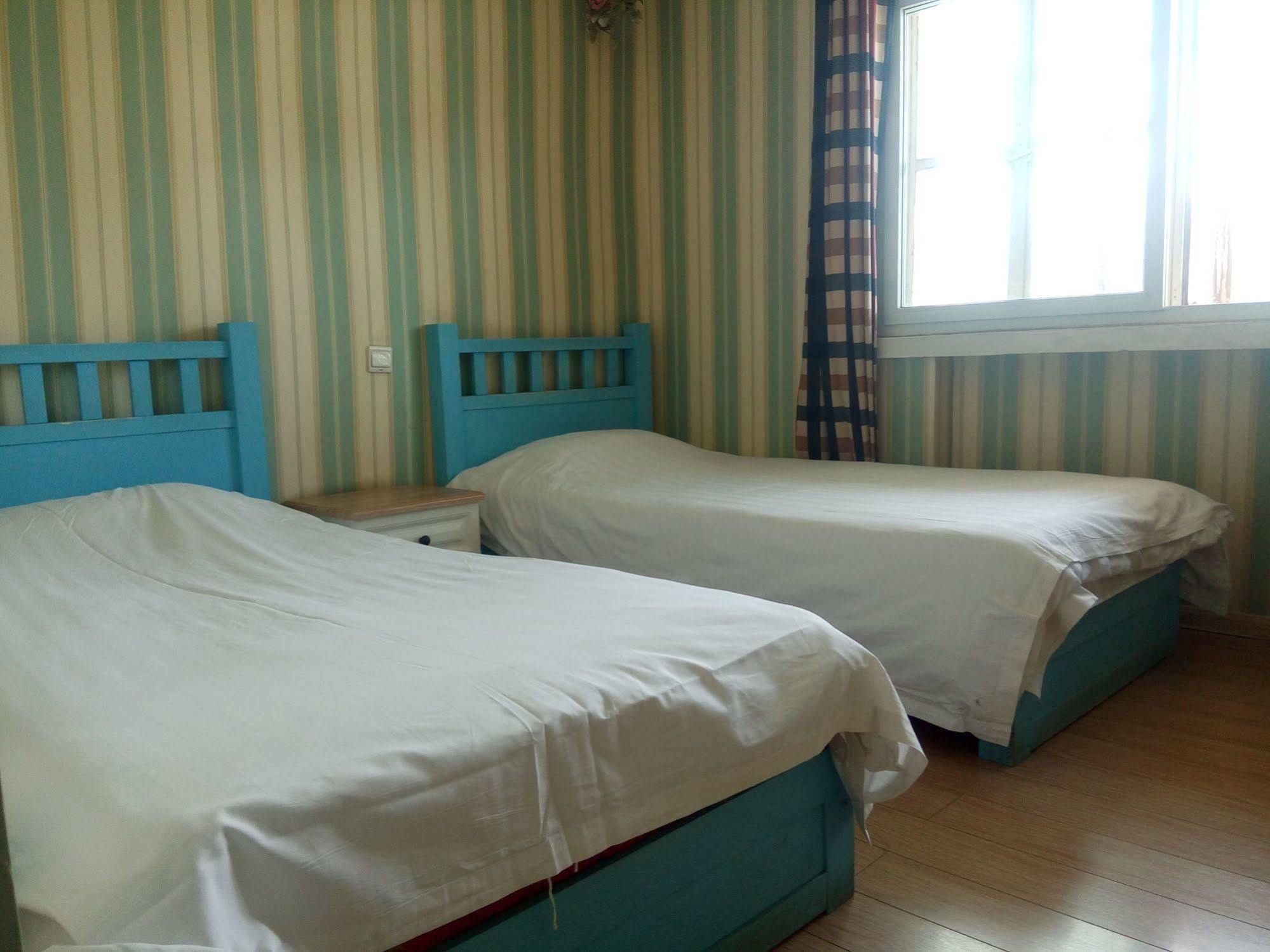 Right Here Hotel Dunhuang Bagian luar foto